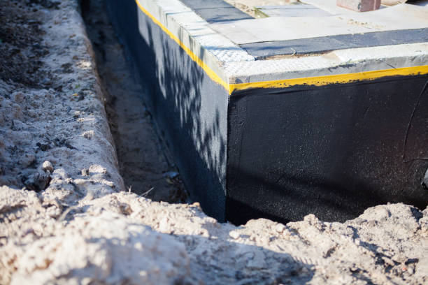 Professional Interior Drainage System technician working in Riverton, NJ